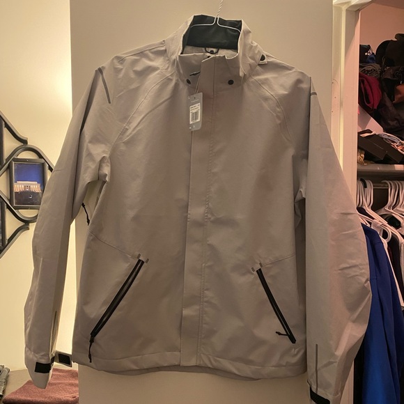 Other - Rain jacket windbreaker in a light tan color NWT